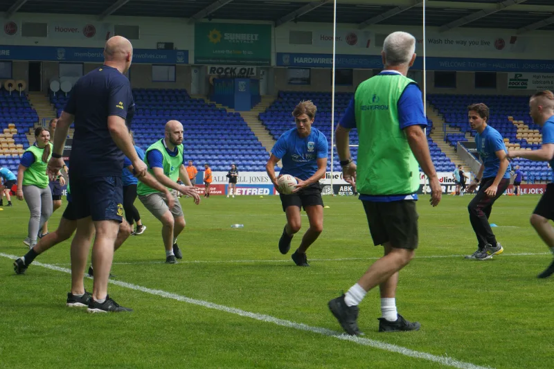 Halliwell Jones MINI Team Takes Part in Warrington Wolves Corporate Touch Rugby Tournament 2024 - Image 416559/4