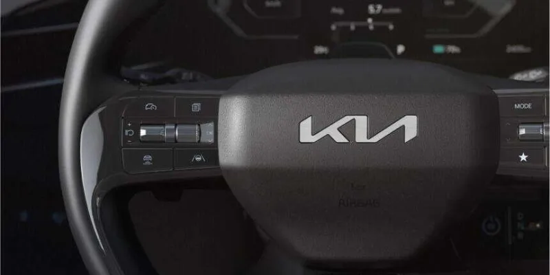 Steering wheel with illuminated Kia emblem